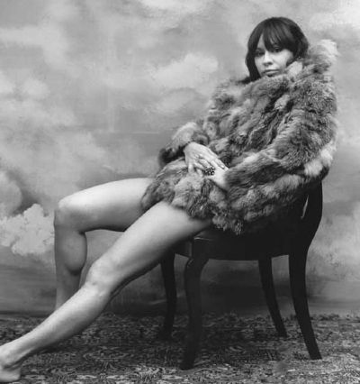 brasilian singer astrud gilberto posing in a fur coat